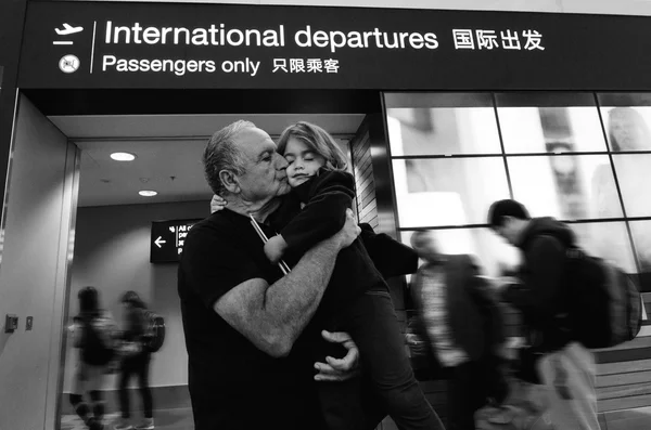 Family farewell in the airport — Stock Photo, Image