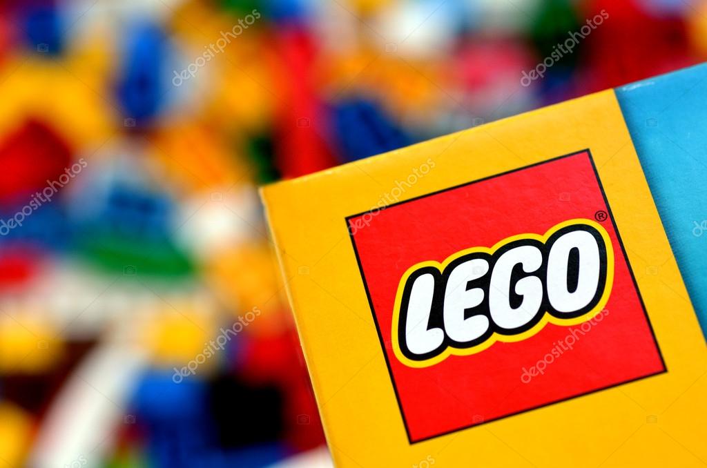 AUCKLAND, NZ - MAR 11 2014:Lego logo against a mix of colorful building blocks in a toy shop.The LEGO bricks of today still fit perfectly with the one that was created more than 50 years ago in 1958.