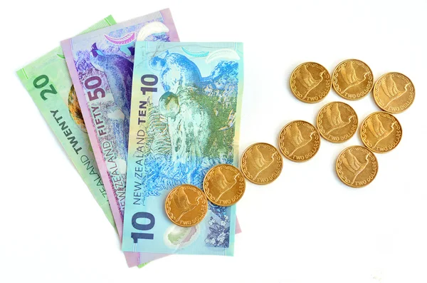 Notas de dólar NZ com seta de tendência ascendente — Fotografia de Stock
