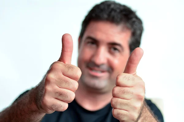 Happy young mature man showing thumbs up — Stock Photo, Image