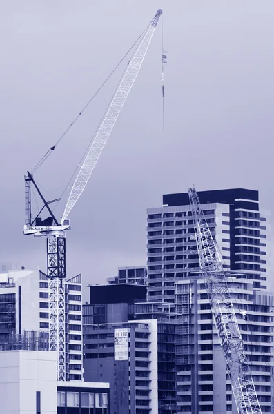 Tower crane in new building construction site — Stock Photo, Image
