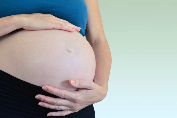 Hamile kadın ve bebek. — Stok fotoğraf