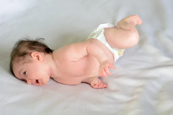 Infant baby roll over — Stock Photo, Image