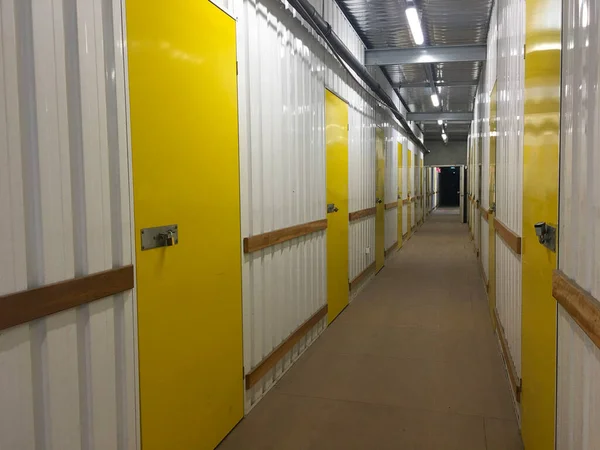 Corridor Full Yellow Doors Unrecognizable Self Storage Place — Stock Photo, Image