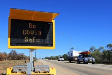 BROOME, WA - JULY 07 2022:Be COVID Safe traffic sign.As of 3 August 2022, Australia had administered 62,492,656 vaccine doses across the country.