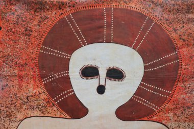 DERBY - JULY 25 2022:Indigenous Australian Art Wandjina Style.The Wandjina are cloud and rain spirits from the mythology  of Australian Aboriginal tribes from the Kimberley region of Western Australia
