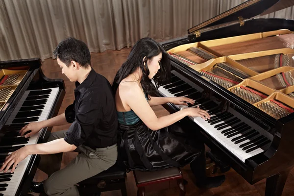 Duet with pianos — Stock Photo, Image