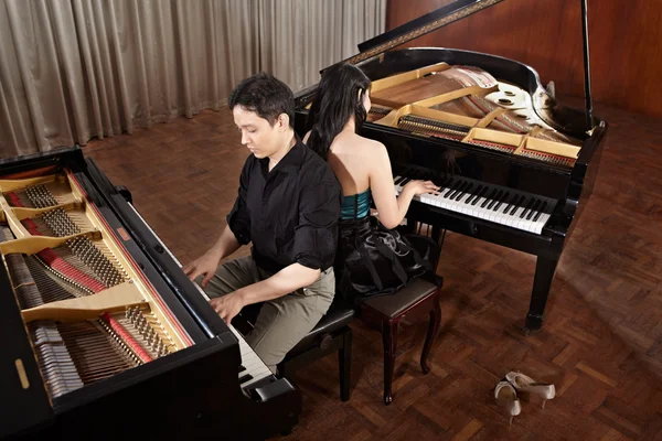 Duet with pianos — Stock Photo, Image