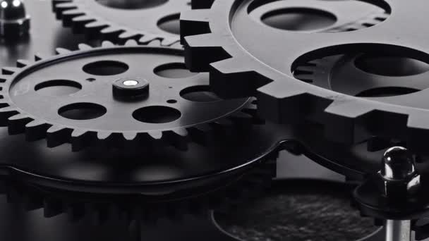 Close Shot Black Gear Cogs Rotating Working Footage — Stockvideo