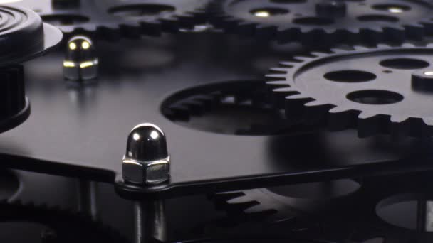 Close Shot Black Gear Cogs Rotating Working Footage — Vídeo de Stock