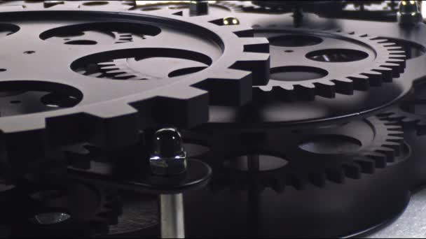 Close Shot Black Gear Cogs Rotating Working Footage — Vídeo de Stock