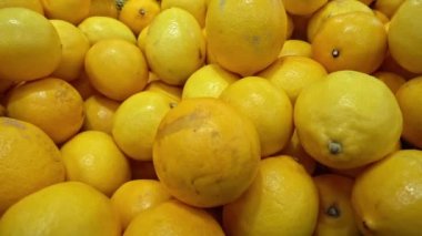 Close Up Shot Of Pile Of Yellow Lemon Market Counter Footage.