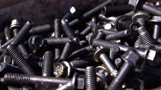 Close Many Used Rusty Oily Old Automotive Industry Bolt Screws — Stock Video