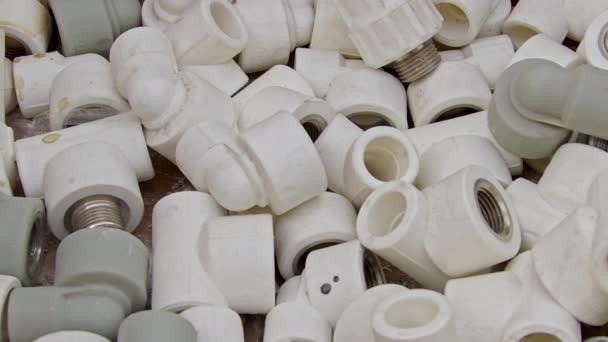 Many White Pvc Water Supply Pipe Fittings Close Footage — Wideo stockowe