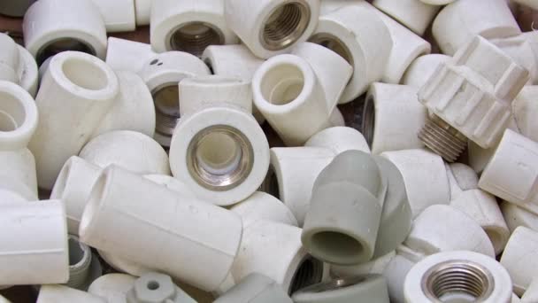 Many White Pvc Water Supply Pipe Fittings Close Footage — Wideo stockowe