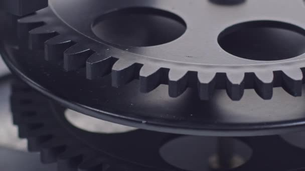 Black Gears Working Synchronously Moving Together — Stockvideo