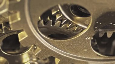Metallic Golden Clock Cogs Wheels Gears Working.