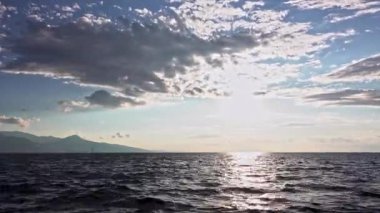 Blue Sky Clouds Movement On The Ocean Footage.