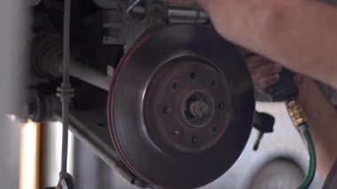 Replacing Car Brake Discs in the Workshop.