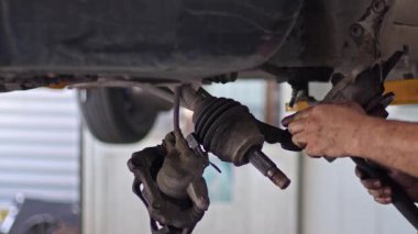 Car Axle Bearing Replacement at the Repair Shop Footage.