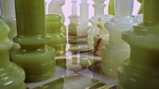Chess Pieces Green White Marble Chessboard — Vídeos de Stock