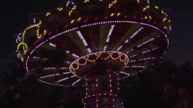 Flying Swing Amusement Park Ride Funfair Footage.