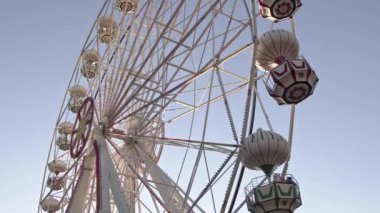 Ferris Wheel at Sunset Light in Amusement Park Footage.