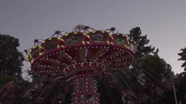 Flying Swing Amusement Park Ride Funfair Footage — стоковое видео