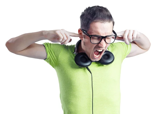 Yelling young man with headphones and black glasses — Stock Photo, Image