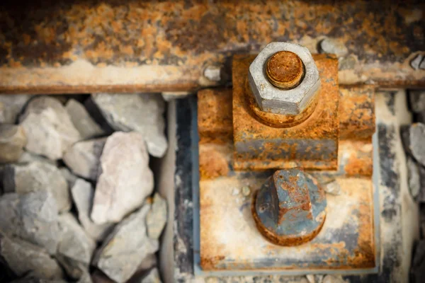 Rusty screw nut on the railroad — Stock Photo, Image