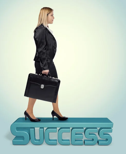 Young blonde business woman on her road to success — Stock Photo, Image