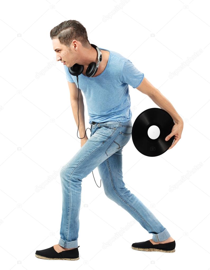 Handsome caucasian male holding vinyl disc