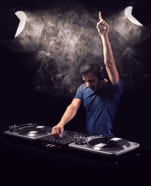 Deejay mixing at party clipart