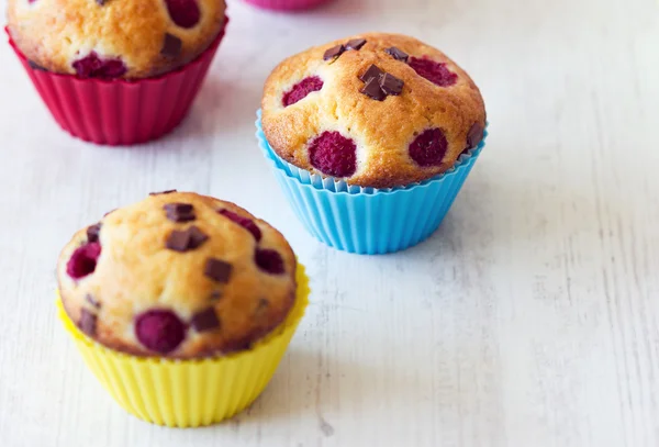 Group of tasty muffins placed on table