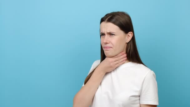 Unhealthy Female Standing Isolated Blue Background Covers Her Mouth Hand — Stock Video