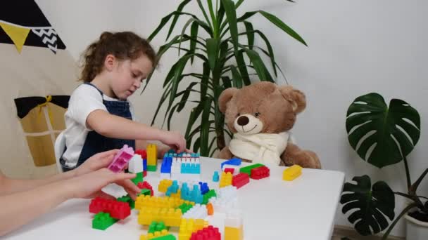 Child Development Leisure Concept Loving Mother Sitting Table Little Kid — Stock Video