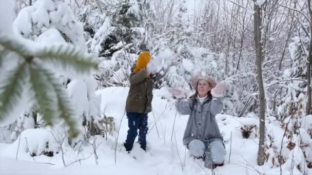 Happy Family Concept Young Mom Playful Daughter Throw Snow Beautiful — Stockvideo