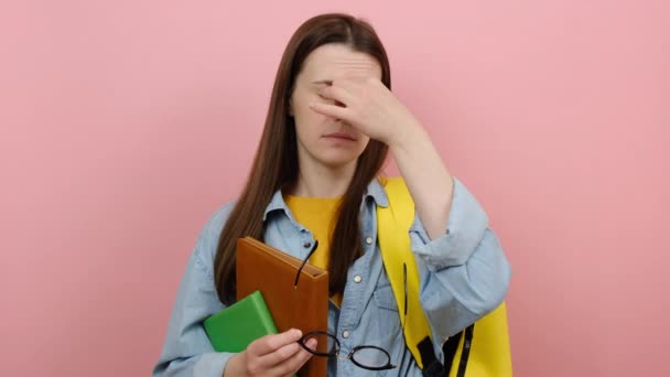 Portrait Girl Teen Student Hold Books Glasses Rub Nose Smiling — Vídeo de stock