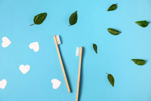 Two Wooden Bamboo Eco Friendly Toothbrushes Green Leaf White Heart — Stock Photo, Image