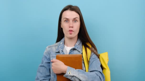 Portrait Fun Girl Teen Student Holding Yellow Backpack Books Crazy — стоковое видео