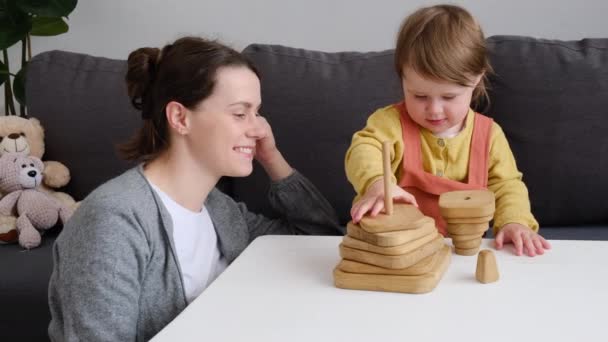 Cute Baby Daughter Young Mom Sits Table Warm Cozy Child — Stock Video