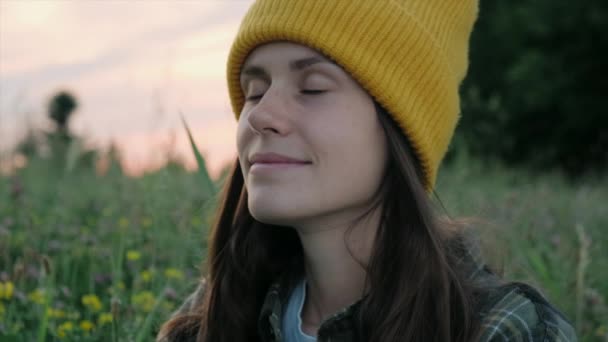 Portrait Dreamy Peaceful Relaxed Smiling Young Woman Knit Beanie Breathing — Stockvideo