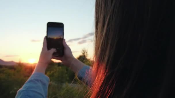 Selective Focus Young Female Holding Mobile Phone Records Video Photo — Stock Video