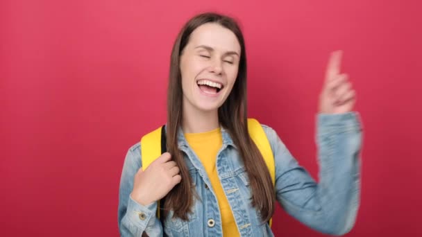 Cheerful Smiling Young Brunette Woman Yellow Student Backpack Intending Realizes — Stockvideo
