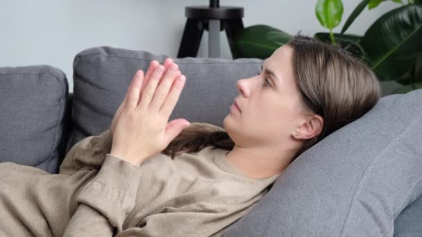 Close Anxious Young Woman Lying Grey Sofa Feeling Doubtful Making — 图库视频影像