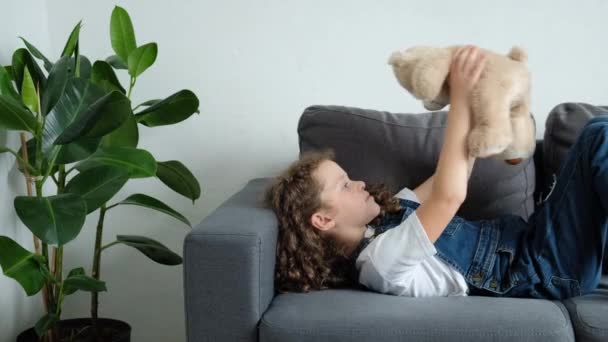 Playful Sweet Little Child Girl Resting Comfortable Couch Home Holding — Stockvideo