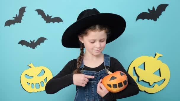 Portrait Pretty Little Kid Girl Holding Small Funny Pumpkin Smiling — Stock Video