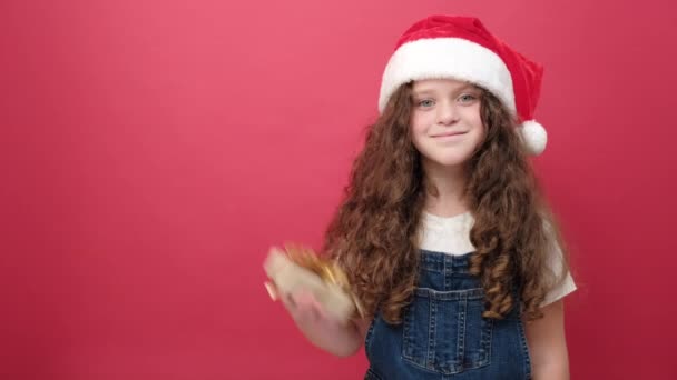 Portrait Happy Little Girl Kid Santa Hat Holding Small Gift — Stock Video