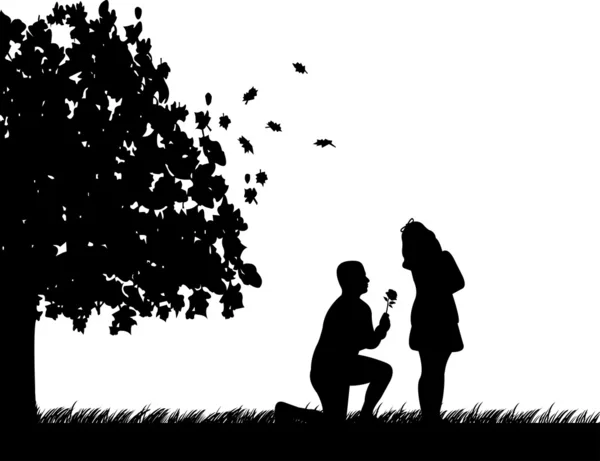 Mladý muž s růží, poklekl a woo dívku na podzim nebo pádu silueta — Stockový vektor