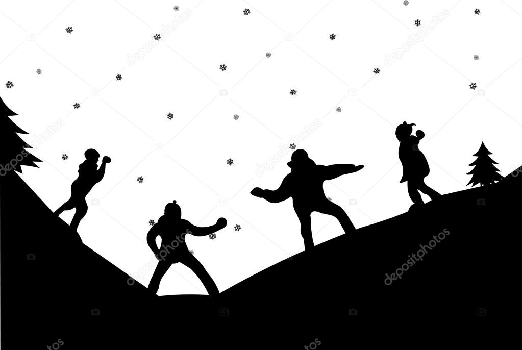 Family in a snowball fight in winter in mountain silhouette